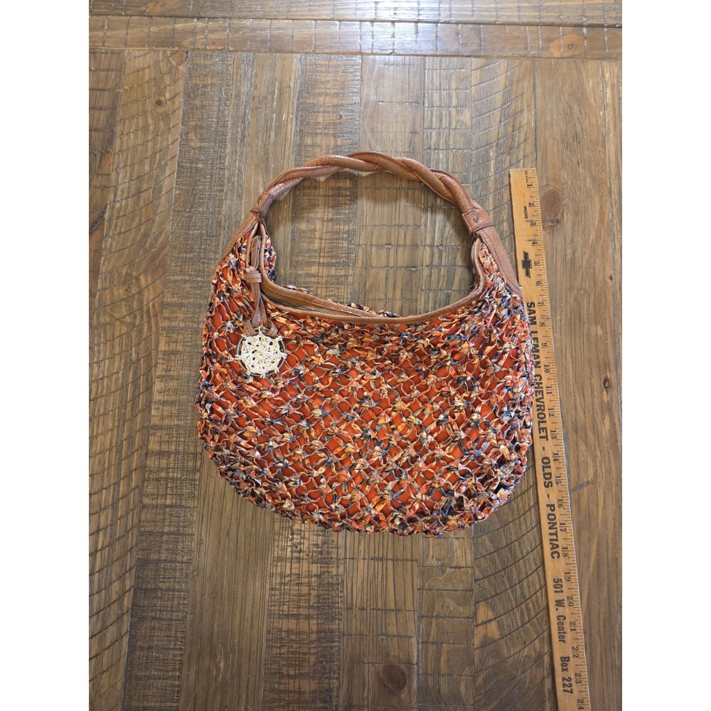 Jessica Simpson hobo bag With A colorful woven Exterior Breaded Shoulder Strap